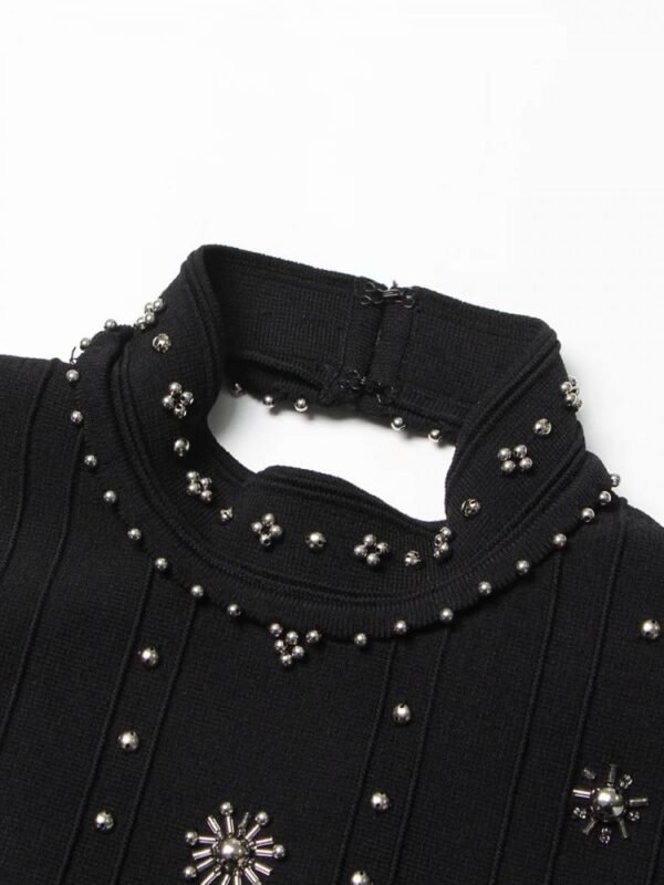 ‏ Charming Black Dress with Shiny Embellishments for an Unforgettable Look